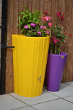 bright yellow water butt planter