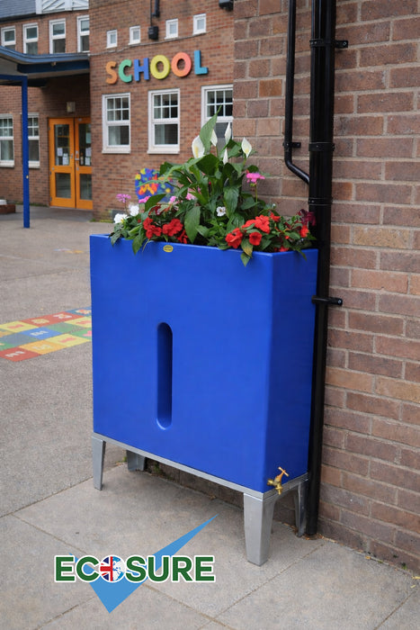 Blue water butt planter with plants against a school building, featuring the ECOSURE brand.